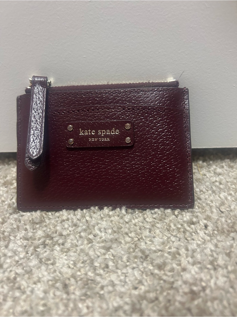 kate spade Burgundy Leather Zip Card Case with Gold Logo
